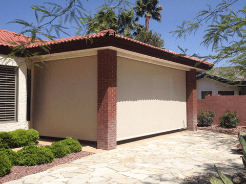 A Sunesta screen provides shade and comfort for a patio in the Southwest